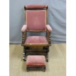 An American rocking chair and a similarly upholstered footstool