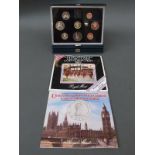 Two deluxe cased Royal Mint coin sets 1984 and 1985,