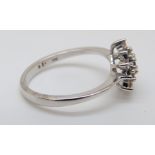 A 9ct white gold ring set with sapphires and diamonds in a cluster, size M, 2.
