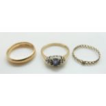 Three rings including a 9ct gold wedding band (3.