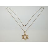 A 14k gold pendant (2.7g) and 9ct gold chain (0.