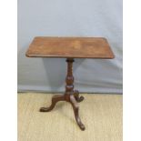 A 19thC mahogany table on a tripod base,