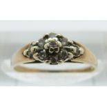 A 9ct gold ring set with diamonds in a cluster, size J, 1.