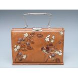 A late 19thC /early 20thC ladies travelling set or case including crochet hooks, scissors,