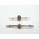 A 9ct gold brooch set with four opals and an emerald and a 9ct gold brooch set with an amethyst, 5.