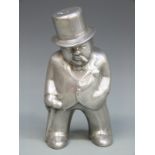 A polished aluminium figure of Sir Winston Churchill,