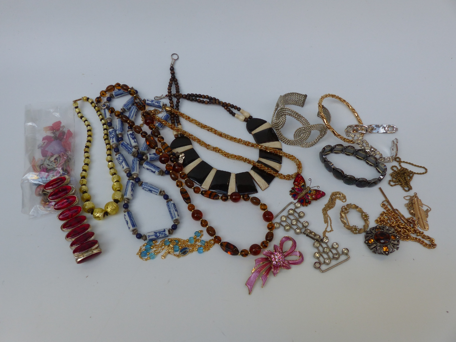 A collection of costume jewellery to include Sarah Coventry bracelets etc