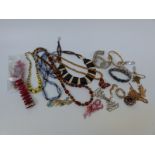 A collection of costume jewellery to include Sarah Coventry bracelets etc
