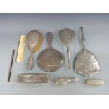 A hallmarked silver mounted hand mirror and similar brush,