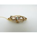 A 15ct gold Edwardian brooch set with an aquamarine,