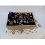 A collection of forty silver rings to include tiger's eye, pressed amber, marcasite, malachite,