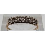 A 9ct gold ring set with diamonds, size P, 1.