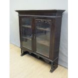 A late 19thC glazed display cabinet,
