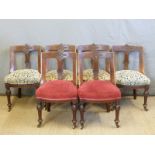 A set of six late Victorian carved back dining chairs with turned,