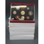Four Royal Mint deluxe proof coin sets for 1995, 1996, 1997 and 1998,