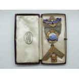 A hallmarked silver and enamel Gibraltar United Service Lodge Masonic jewel / medal in Kenning and