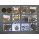 A collection of copper and bronze UK coinage, some with lustre,