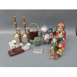 Plated teapot, brass and spiral oak candlesticks, biscuit barrel, large Russian doll, Daci camera,