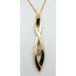 A 9ct gold necklace set with a cubic zirconia, 3.