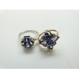 A 9ct white gold ring set with tanzanites and diamonds and a 9ct gold example set with tanzanites,
