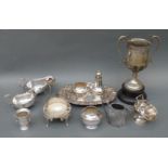 A quantity of various silver plated items to include cream jug, sauce boats, sugar basin and scoop,