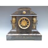 A large French 19thC two-train slate mantel clock with visible escapement.