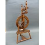 An ash spinning wheel with shuttles