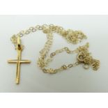 An 18ct gold cross pendant and a 9ct gold chain