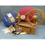 A lace spinning wheel and pad with bobbins