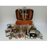 A collection of costume jewellery to include faux pearls,