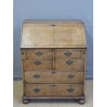 A small Georgian mahogany bureau with fitted interior,