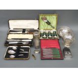 A quantity of cased silver plated cutlery including dessert sets and carving set,