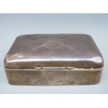 A hallmarked silver cigarette box with inscription 'Presented by Vickers Ltd,