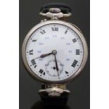 A gentleman's silver cased wristwatch converted from a pocket watch with black hands and Roman