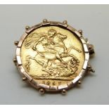 An 1897 gold full sovereign in yellow metal mount,