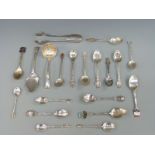 A quantity of hallmarked silver and white metal collector's spoons including three with import