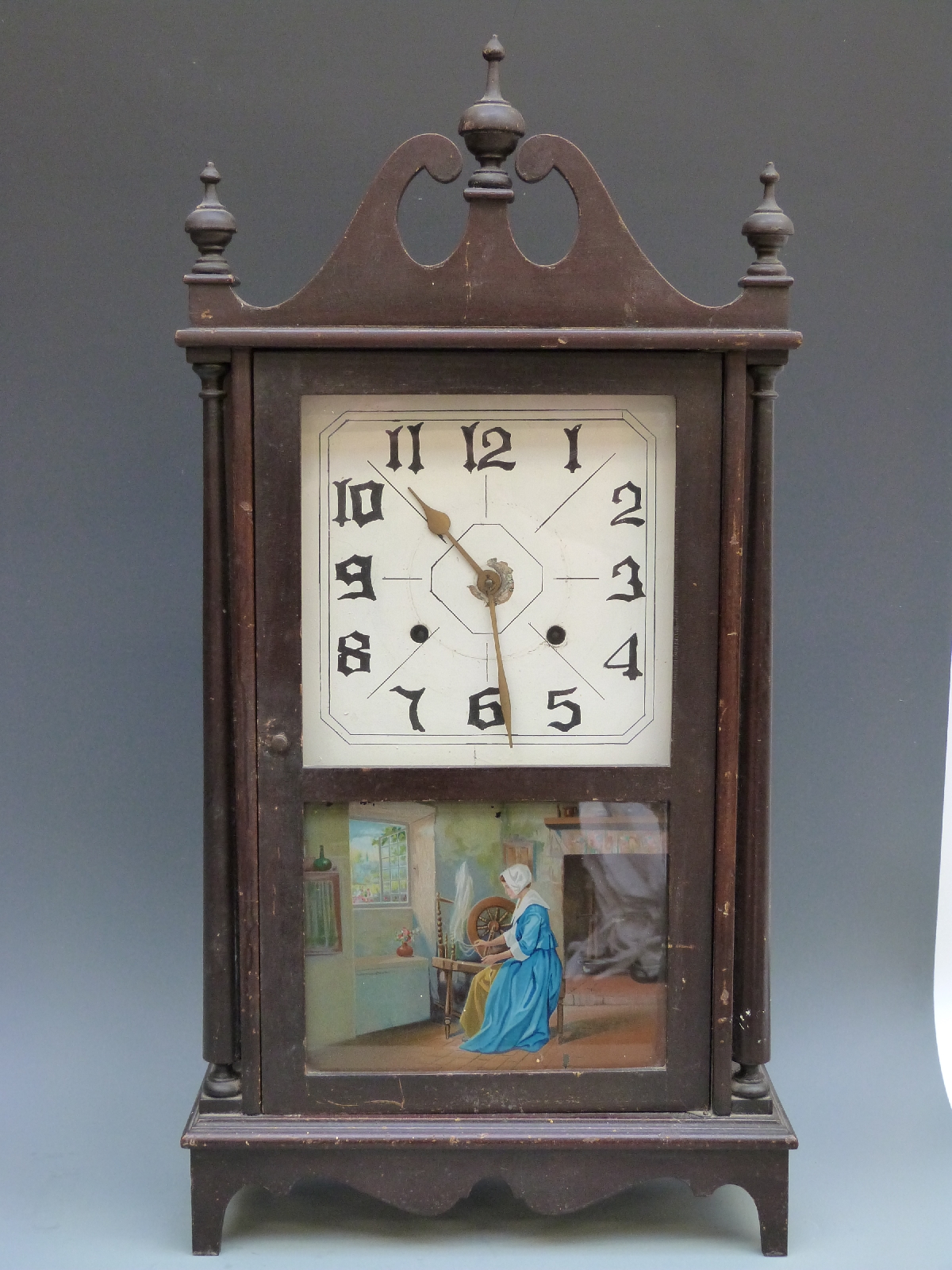 American wall shelf two train clock in stained wood case,