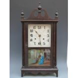 American wall shelf two train clock in stained wood case,