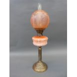 A Victorian brass and moulded glass oil lamp,