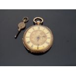 An 18k yellow metal cased ladies fob watch with engraved foliate decoration, marked to case 18k,
