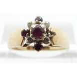 A 9ct gold ring set with rubies and diamonds, size N, 3.