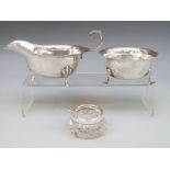 An Adie Brothers hallmarked silver sauce boat, Birmingham 1938, silver sugar bowl,