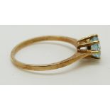 A 9ct gold ring set with a zircon, size Q, 2.