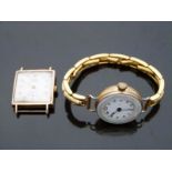 Trebex 9ct gold wristwatch with subsidiary seconds dial, gold hands and Arabic numerals,