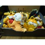 Ten Garfield soft toys to include 'Beefeater', 'Golfer', 'Canadian Mountie', hand puppets etc.
