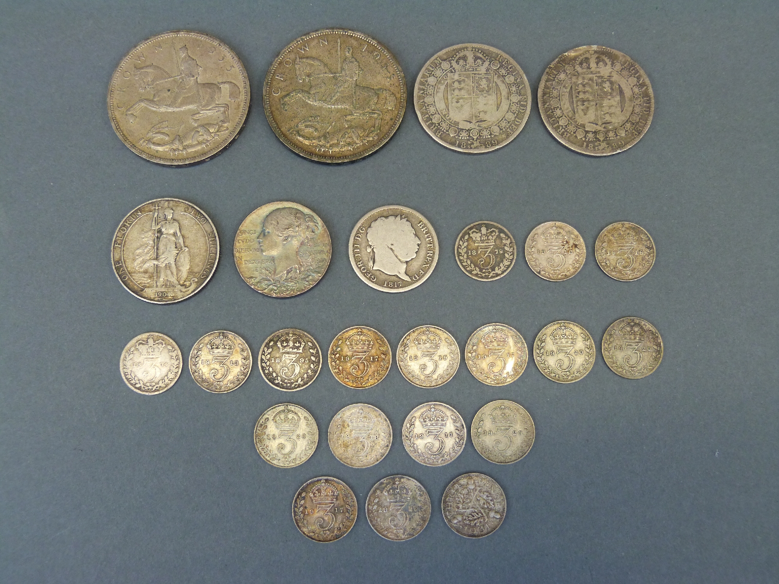 A collection of various silver coins to include Victorian commemorative medal coin,