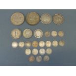 A collection of various silver coins to include Victorian commemorative medal coin,