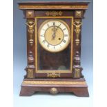Continental late 19thC single train mahogany mantel clock, the Roman dial with beetle style hands,
