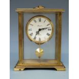 Rapport c1960s single train brass carriage style clock with pendulum and keyless 8-day movement.