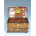 A Georgian mahogany two division tea caddy with shell inlay to lid,